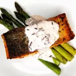 Wild Atlantic salmon seasoned and seared served with lemon-butter sauce