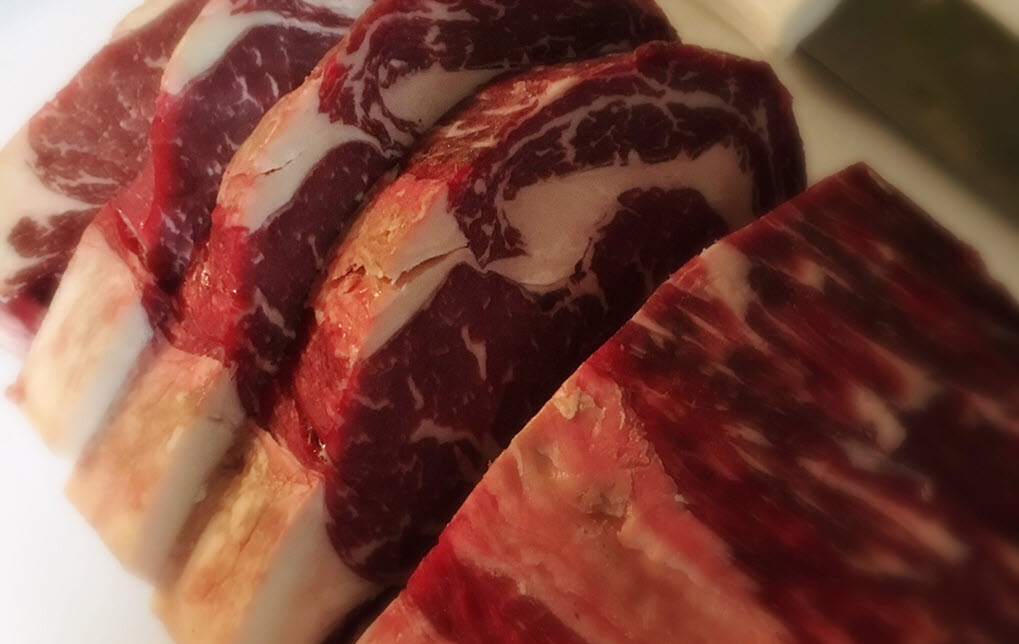 Michael Johns 14–21 Day Dry Aged Ribeye Sliced Into Steak Portions